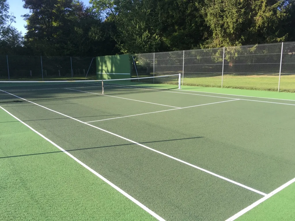 Rénovation d’un court de tennis en gazon synthétique à Paris